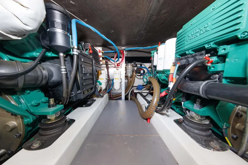 Gotali Yacht Photos Pics Engine room of 2016 Beneteau Swift Trawler 44, showcasing dual engines and mechanical components.