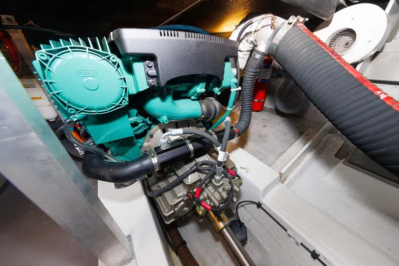 Gotali Yacht Photos Pics Engine room of 2016 Beneteau Swift Trawler 44, featuring a well-maintained marine engine.