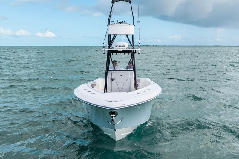  Yacht Photos Pics Futuristic SeeVee 32 boat navigating open sea under cloudy sky, 2099 model.