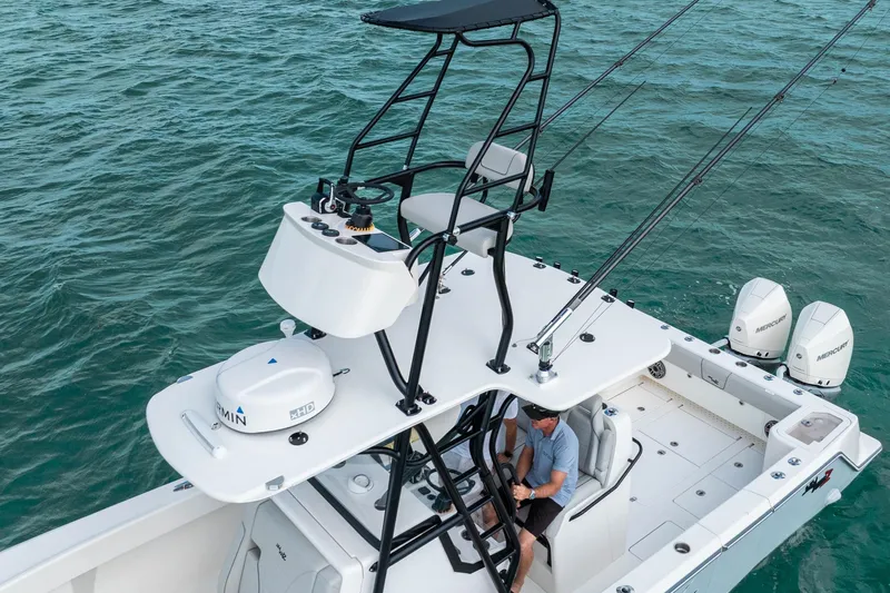  Yacht Photos Pics SeeVee 32 boat on water, featuring advanced navigation and fishing equipment, 2099 model.