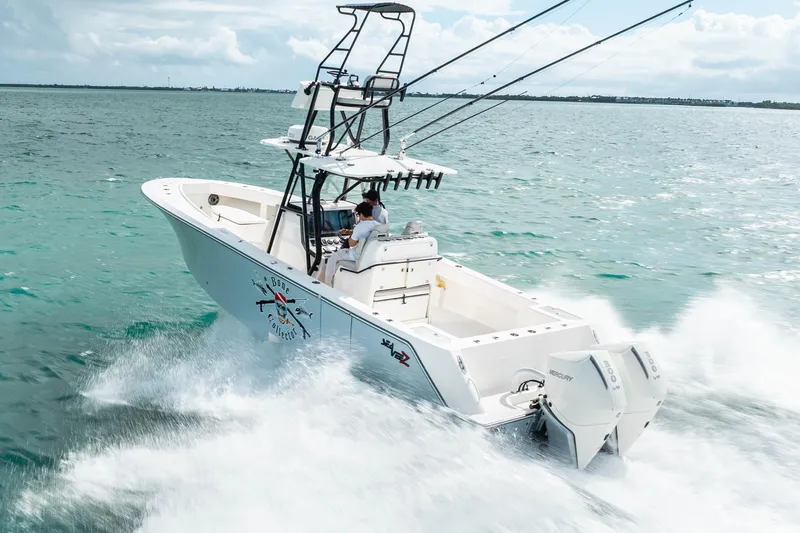  Yacht Photos Pics High-speed SeeVee 32 boat cruising on open water, 2099 model.