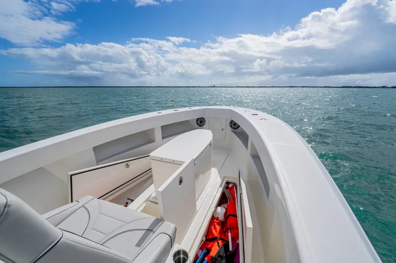  Yacht Photos Pics Futuristic SeeVee 32 boat on open water, showcasing sleek design and spacious deck.