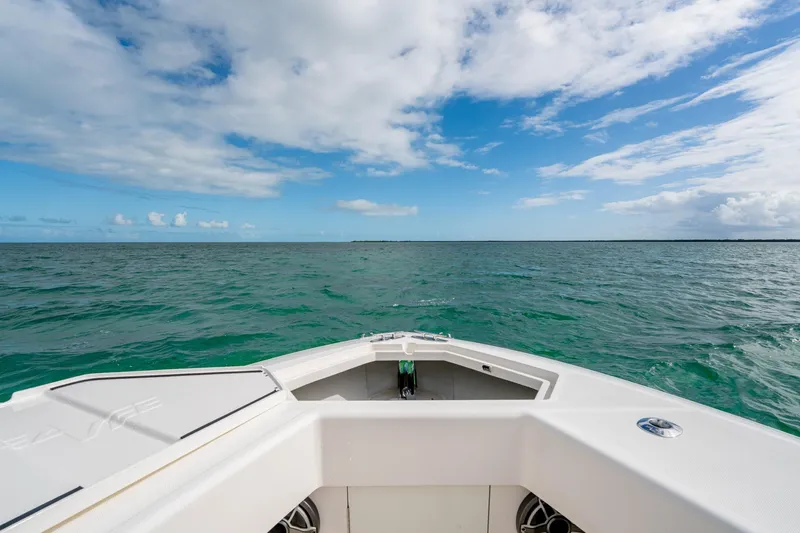  Yacht Photos Pics Bow view of SeeVee 32 boat on open ocean, 2099 model.