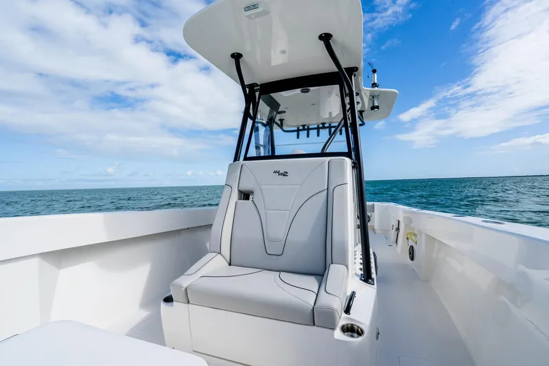  Yacht Photos Pics Futuristic SeeVee 32 boat on open sea, showcasing sleek design and modern features.