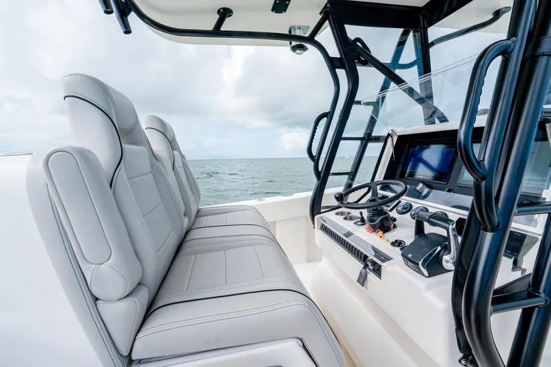  Yacht Photos Pics Modern SeeVee 32 boat interior with sleek seating and advanced control panel, year 2099.