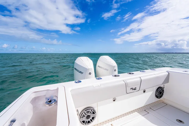  Yacht Photos Pics SeeVee 32 boat with Mercury engines on open sea, clear sky, 2099 model.