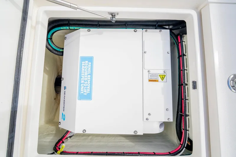  Yacht Photos Pics Seakeeper unit in SeeVee 32 boat, 2099 model, with wiring and panel removal instructions.