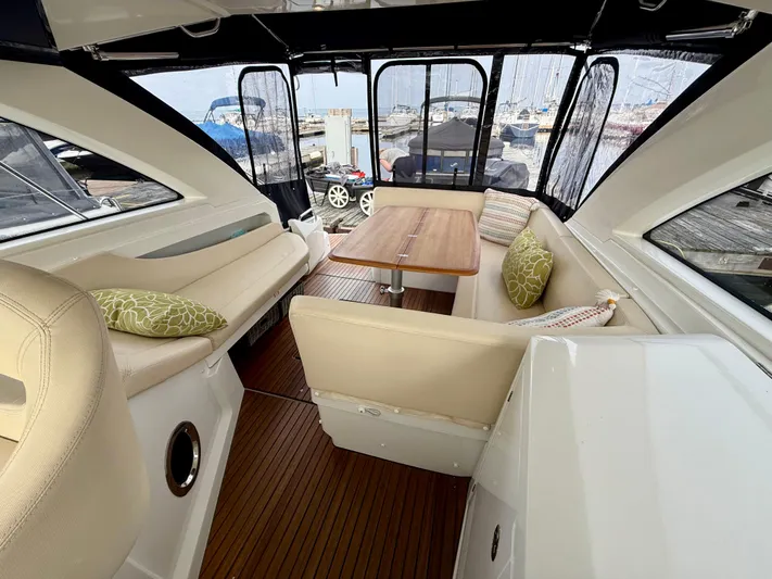 Yacht Photos Pics Interior of 2013 Beneteau Gran Turismo 34 yacht with seating and table.