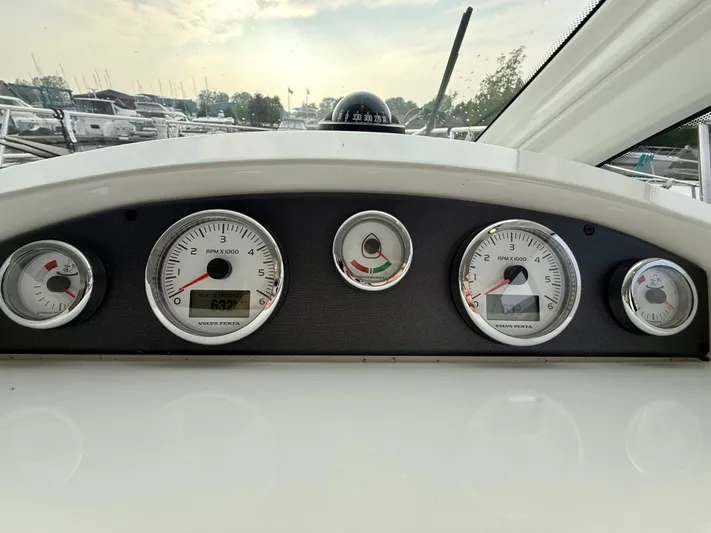  Yacht Photos Pics Dashboard of 2013 Beneteau Gran Turismo 34 with gauges and compass.