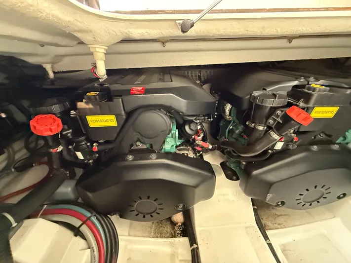  Yacht Photos Pics Engine compartment of 2013 Beneteau Gran Turismo 34, showcasing dual engines and components.