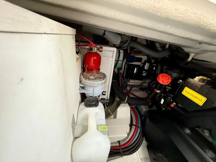  Yacht Photos Pics Engine compartment of 2013 Beneteau Gran Turismo 34 with visible components and wiring.