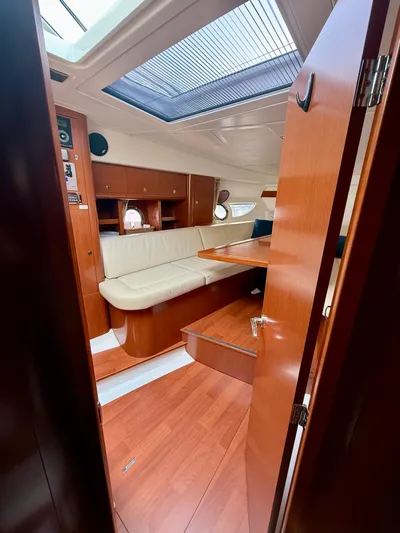  Yacht Photos Pics 2013 Beneteau Gran Turismo 34 interior with wood finish and skylight.
