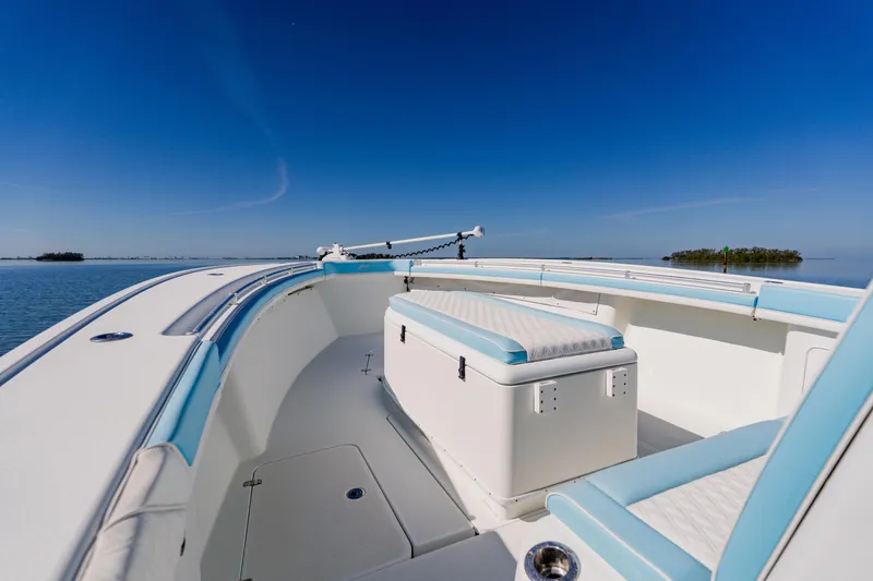  Yacht Photos Pics 2015 Yellowfin 39 Offshore boat on calm water under clear blue sky.