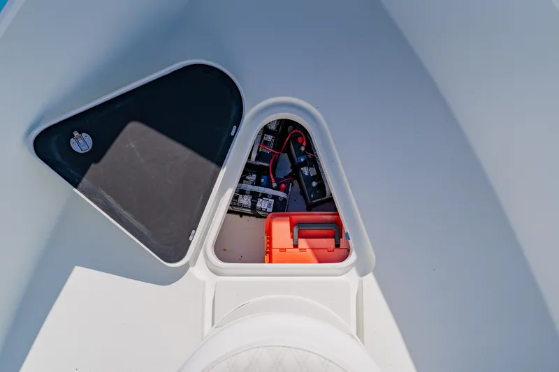  Yacht Photos Pics 2015 Yellowfin 39 Offshore boat storage compartment with battery and equipment.