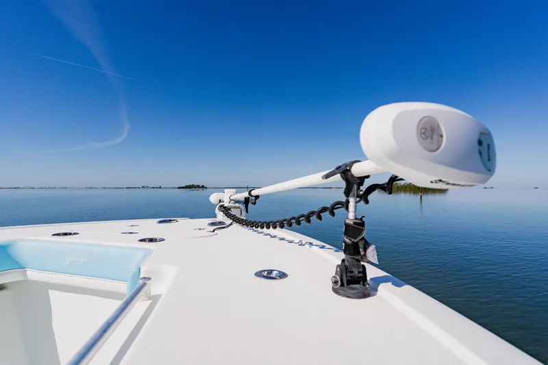  Yacht Photos Pics 2015 Yellowfin 39 Offshore boat on calm water under clear blue sky.