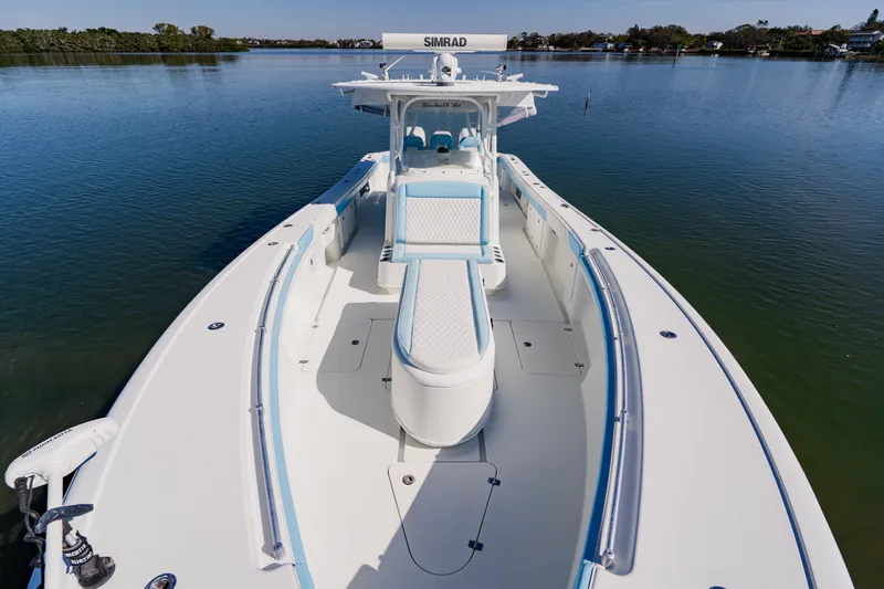 Yacht Photos Pics 2015 Yellowfin 39 Offshore boat on calm water, featuring spacious deck and seating.