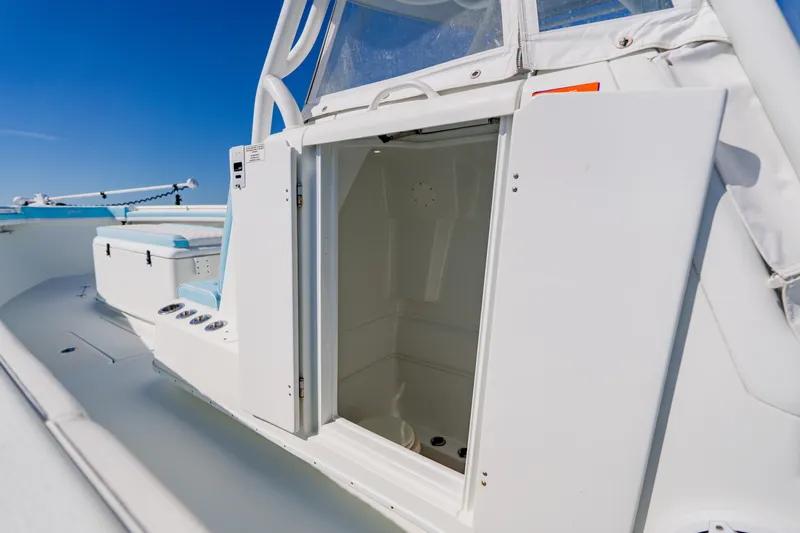  Yacht Photos Pics 2015 Yellowfin 39 Offshore boat interior with open cabin door.