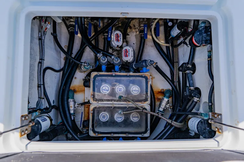  Yacht Photos Pics 2015 Yellowfin 39 Offshore boat engine compartment with hoses and gauges.