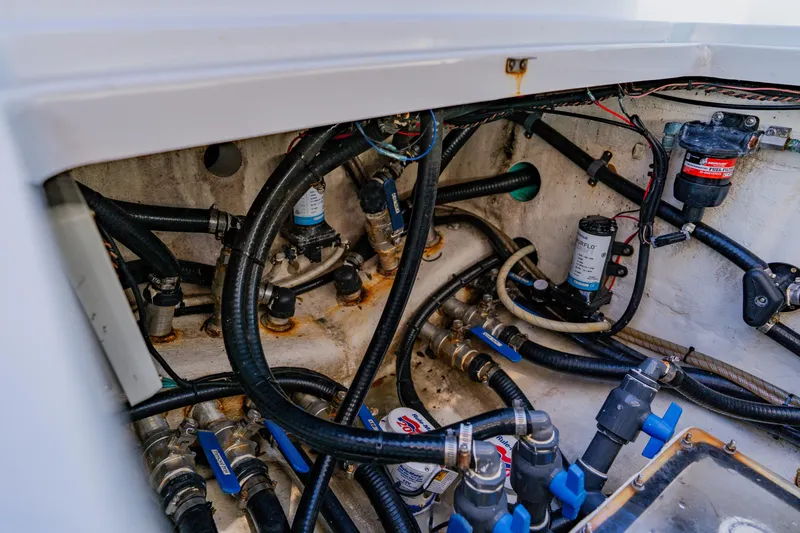  Yacht Photos Pics 2015 Yellowfin 39 Offshore boat engine compartment with hoses and fuel filters.