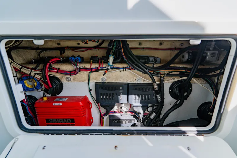  Yacht Photos Pics Electrical wiring and components inside a 2015 Yellowfin 39 Offshore boat compartment.