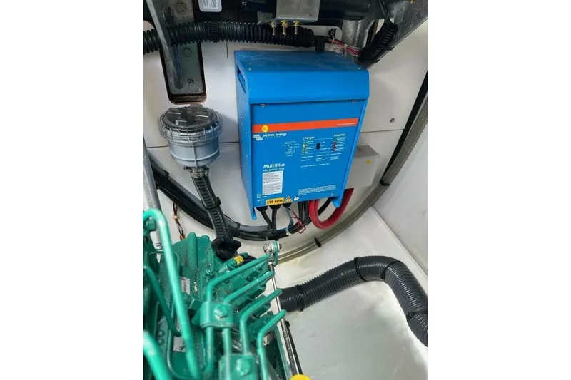 Honu Kai Yacht Photos Pics Engine room of 2023 Fountaine Pajot Catamaran Astrea 42 with Victron Energy MultiPlus inverter.
