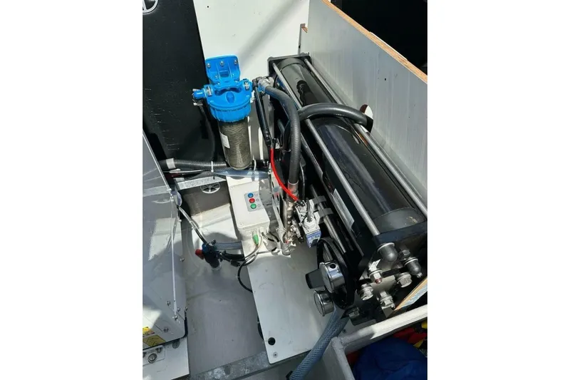 Honu Kai Yacht Photos Pics Engine compartment of 2023 Fountaine Pajot Catamaran Astrea 42, featuring mechanical components.