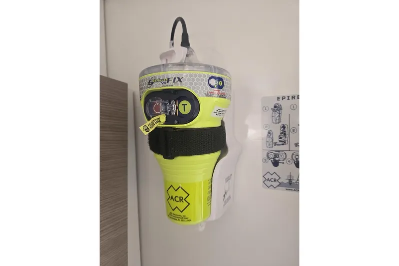 Honu Kai Yacht Photos Pics Emergency beacon on 2023 Fountaine Pajot Catamaran Astrea 42, mounted with instructions.