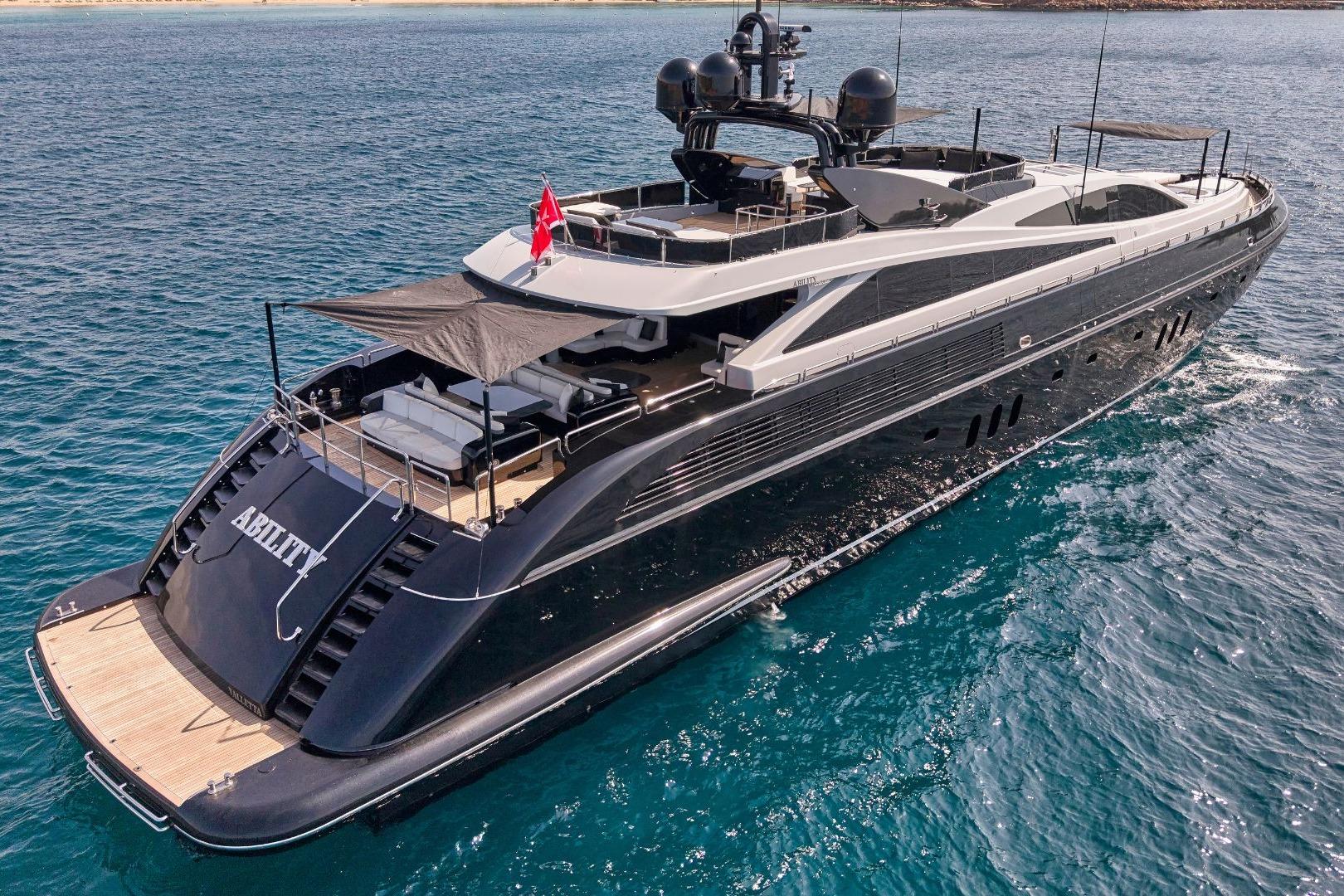 Luxurious 2007 Codecasa 41 S yacht cruising on clear blue waters.