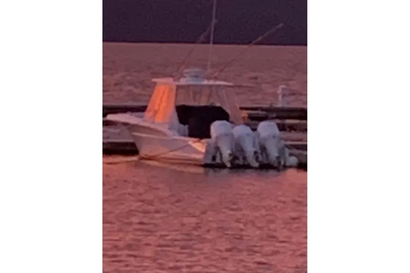  Yacht Photos Pics 2017 Buddy Davis 34 Center Console boat at sunset on the water.