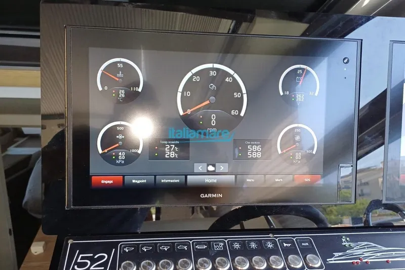  Yacht Photos Pics Garmin display on 2017 Fiart 52 yacht showing engine gauges and controls.