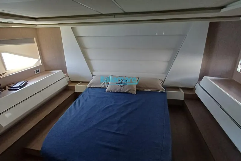 Yacht Photos Pics Luxurious cabin interior of 2017 Fiart 52 yacht with modern design and cozy bedding.