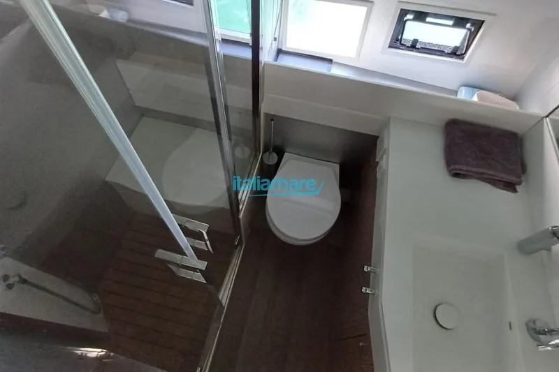  Yacht Photos Pics Modern bathroom interior of 2017 Fiart 52 yacht with shower and toilet.