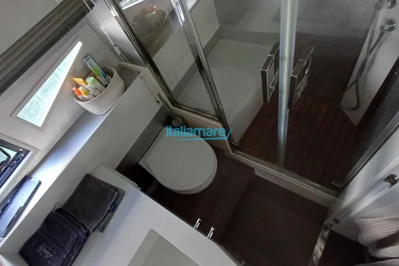  Yacht Photos Pics Luxurious bathroom interior of 2017 Fiart 52 yacht with modern amenities.