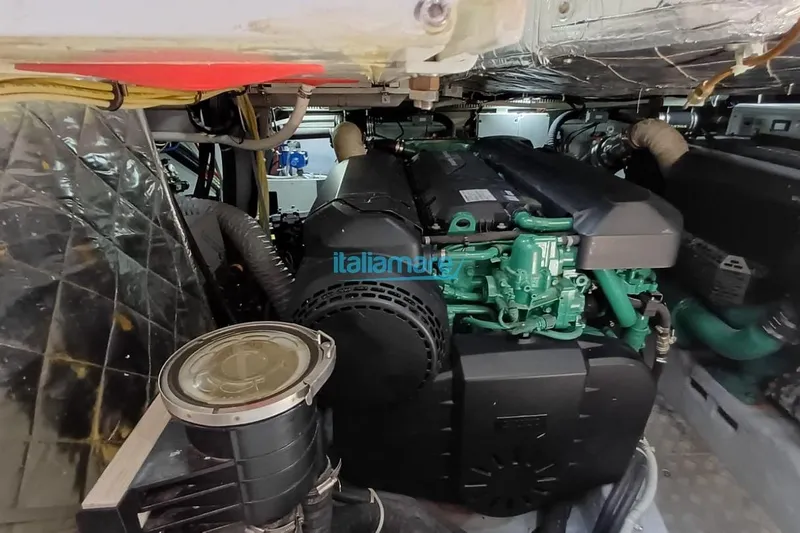  Yacht Photos Pics Engine room of a 2017 Fiart 52 yacht, showcasing mechanical components and wiring.