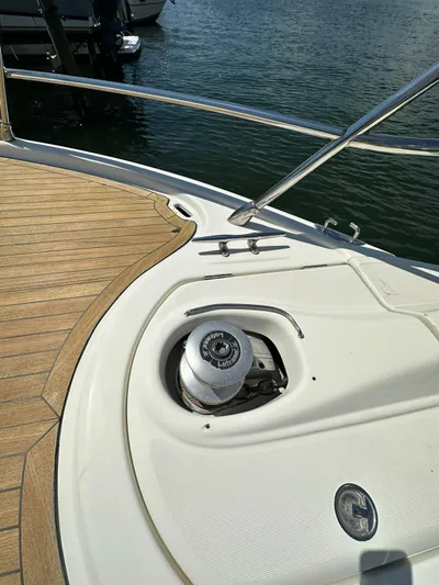 Zuri Yacht Photos Pics 2007 Cranchi Mediterranee 50 HT yacht deck with winch and railing.