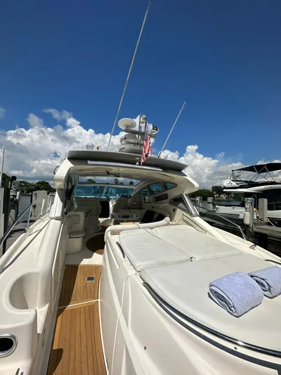 Zuri Yacht Photos Pics 2007 Cranchi Mediterranee 50 HT yacht docked, featuring spacious deck and modern amenities.