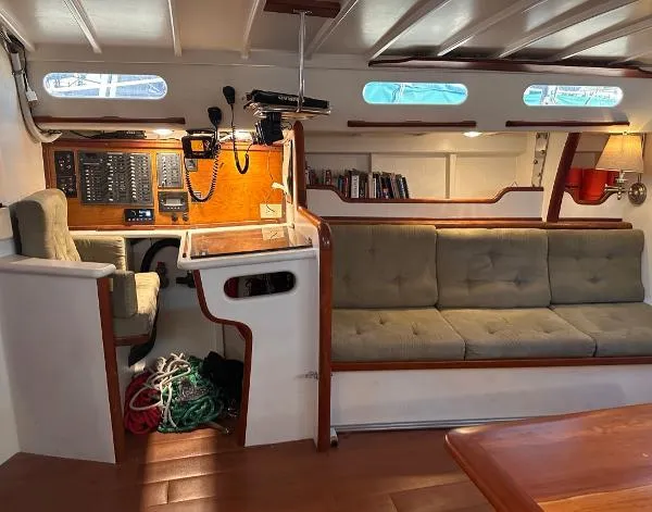  Yacht Photos Pics Interior of 1988 Ocean Custom boat with seating, control panel, and nautical decor.