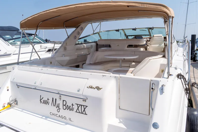  Yacht Photos Pics 1995 Sea Ray 500 Sundancer yacht docked, featuring spacious seating and canopy, Chicago, IL.