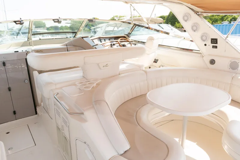  Yacht Photos Pics Luxurious 1995 Sea Ray 500 Sundancer yacht interior with plush seating and elegant design.