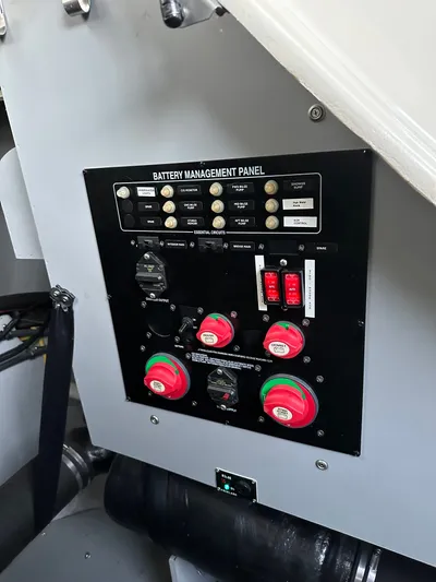 Continuous Wave Yacht Photos Pics Battery management panel on a 2007 Meridian 391 boat, featuring switches and circuit controls.