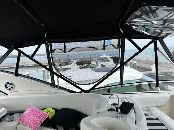 Continuous Wave Yacht Photos Pics Interior view of a 2007 Meridian 391 yacht with seating and ocean backdrop.