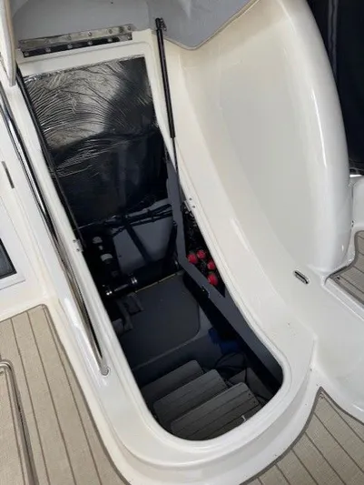 Continuous Wave Yacht Photos Pics 2007 Meridian 391 yacht interior hatch with visible stairs and equipment.