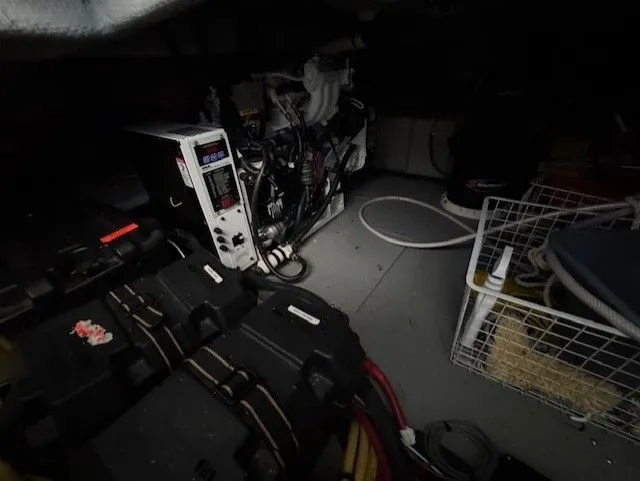 Continuous Wave Yacht Photos Pics Engine room of a 2007 Meridian 391 yacht with equipment and storage.