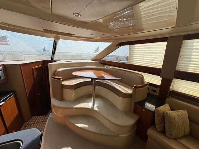 Continuous Wave Yacht Photos Pics Luxurious interior of a 2007 Meridian 391 yacht with elegant seating and table.