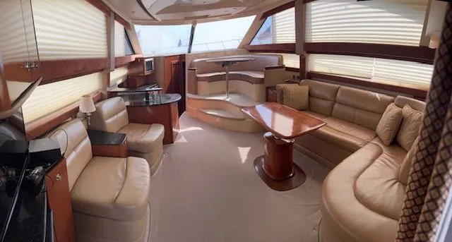 Continuous Wave Yacht Photos Pics Luxurious interior of a 2007 Meridian 391 yacht with leather seating and wooden accents.