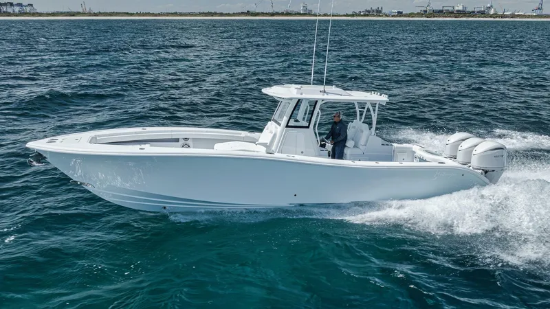 36 Offshore Yacht Photos Pics 2025 Yellowfin 36 Offshore boat cruising on open water.