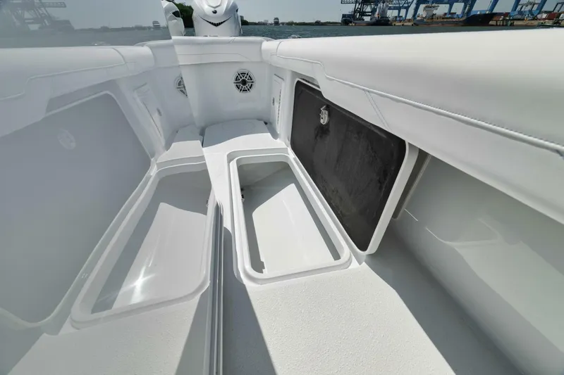 36 Offshore Yacht Photos Pics 2025 Yellowfin 36 Offshore boat interior with open storage compartments.