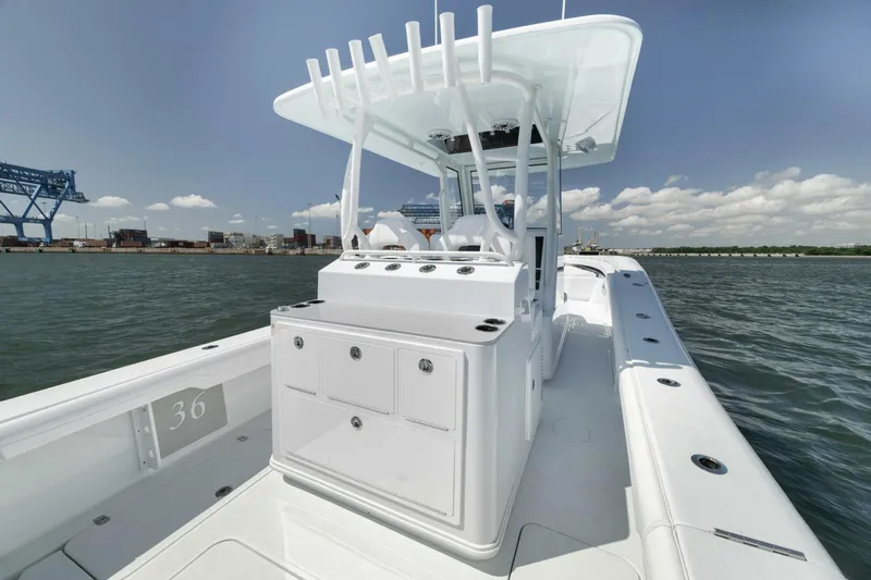 36 Offshore Yacht Photos Pics 2025 Yellowfin 36 Offshore boat on water, featuring sleek design and spacious deck.