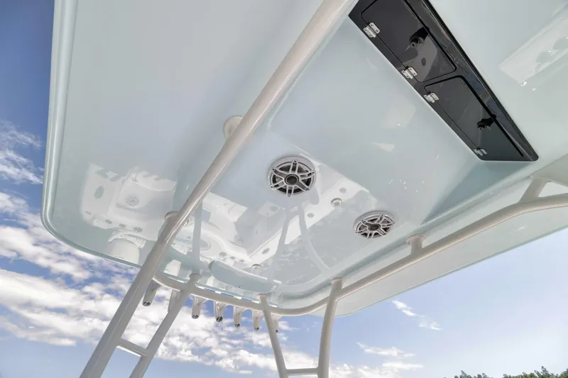36 Offshore Yacht Photos Pics 2025 Yellowfin 36 Offshore boat roof with speakers and sky view.