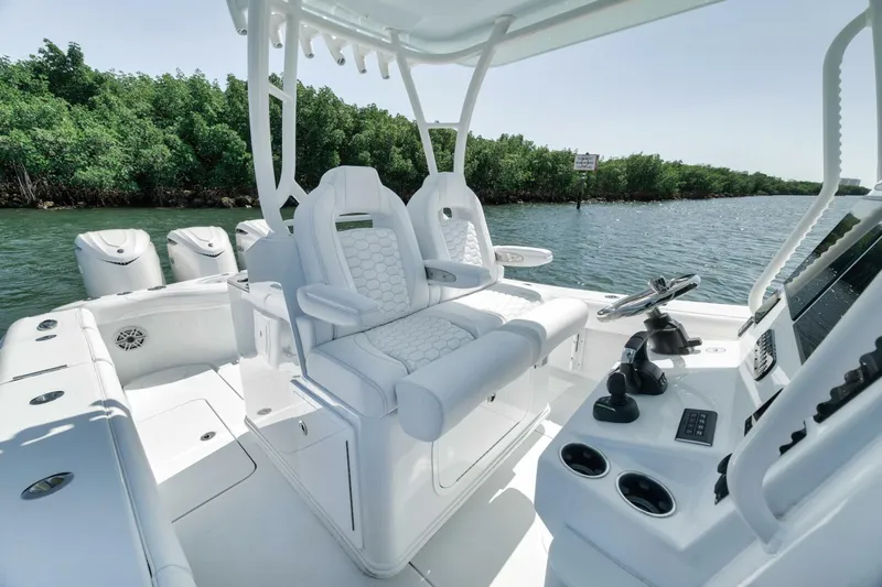 36 Offshore Yacht Photos Pics 2025 Yellowfin 36 Offshore boat interior with modern helm and seating.